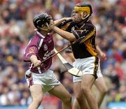 12 September 2004; Liam Tierney, Kilkenny goalkeeper, in action against Kerril Wade, Galway. All-Ireland Minor Hurling Championship Final, Galway v Kilkenny, Croke Park, Dublin. Picture credit; Damien Eagers / SPORTSFILE *** Local Caption *** Any photograph taken by SPORTSFILE during, or in connection with, the 2004 Guinness All-Ireland Hurling Final which displays GAA logos or contains an image or part of an image of any GAA intellectual property, or, which contains images of a GAA player/players in their playing uniforms, may only be used for editorial and non-advertising purposes.  Use of photographs for advertising, as posters or for purchase separately is strictly prohibited unless prior written approval has been obtained from the Gaelic Athletic Association.