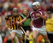 12 September 2004; Paul Loughnane, Galway, in action against Eddie O'Donoghue, Kilkenny. All-Ireland Minor Hurling Championship Final, Galway v Kilkenny, Croke Park, Dublin. Picture credit; Brendan Moran / SPORTSFILE *** Local Caption *** Any photograph taken by SPORTSFILE during, or in connection with, the 2004 Guinness All-Ireland Hurling Final which displays GAA logos or contains an image or part of an image of any GAA intellectual property, or, which contains images of a GAA player/players in their playing uniforms, may only be used for editorial and non-advertising purposes.  Use of photographs for advertising, as posters or for purchase separately is strictly prohibited unless prior written approval has been obtained from the Gaelic Athletic Association.