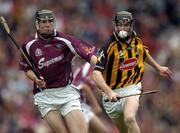 12 September 2004; Gavin Nolan, Kilkenny, in action against Gerard Mahon, Galway. All-Ireland Minor Hurling Championship Final, Galway v Kilkenny, Croke Park, Dublin. Picture credit; Brendan Moran / SPORTSFILE *** Local Caption *** Any photograph taken by SPORTSFILE during, or in connection with, the 2004 Guinness All-Ireland Hurling Final which displays GAA logos or contains an image or part of an image of any GAA intellectual property, or, which contains images of a GAA player/players in their playing uniforms, may only be used for editorial and non-advertising purposes.  Use of photographs for advertising, as posters or for purchase separately is strictly prohibited unless prior written approval has been obtained from the Gaelic Athletic Association.