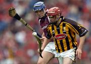 12 September 2004; Nicholas Kenny, Kilkenny, in action against Keith Kilkenny, Galway. All-Ireland Minor Hurling Championship Final, Galway v Kilkenny, Croke Park, Dublin. Picture credit; Brendan Moran / SPORTSFILE *** Local Caption *** Any photograph taken by SPORTSFILE during, or in connection with, the 2004 Guinness All-Ireland Hurling Final which displays GAA logos or contains an image or part of an image of any GAA intellectual property, or, which contains images of a GAA player/players in their playing uniforms, may only be used for editorial and non-advertising purposes.  Use of photographs for advertising, as posters or for purchase separately is strictly prohibited unless prior written approval has been obtained from the Gaelic Athletic Association.