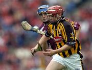 12 September 2004; Nicholas Kenny, Kilkenny, in action against Keith Kilkenny, Galway. All-Ireland Minor Hurling Championship Final, Galway v Kilkenny, Croke Park, Dublin. Picture credit; Brendan Moran / SPORTSFILE *** Local Caption *** Any photograph taken by SPORTSFILE during, or in connection with, the 2004 Guinness All-Ireland Hurling Final which displays GAA logos or contains an image or part of an image of any GAA intellectual property, or, which contains images of a GAA player/players in their playing uniforms, may only be used for editorial and non-advertising purposes.  Use of photographs for advertising, as posters or for purchase separately is strictly prohibited unless prior written approval has been obtained from the Gaelic Athletic Association.