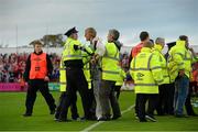 6 October 2013; Supporters, pitch security and members of An Garda Síochána during the game. FAI Ford Cup, Semi-Final, Sligo Rovers v Shamrock Rovers, The Showgrounds, Sligo. Picture credit: David Maher / SPORTSFILE