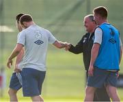 8 October 2013; Republic of Ireland interim manager Noel King shakes hands with Dundalk FC's Kurtis Byrne during squad training ahead of their 2014 FIFA World Cup Qualifier, Group C, game against Germany on Friday. Republic of Ireland Squad Training, Gannon Park, Malahide, Co. Dublin. Picture credit: David Maher / SPORTSFILE