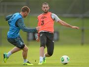 8 October 2013; Marc Wilson and James McCarthy, Republic of Ireland, in action during squad training ahead of their 2014 FIFA World Cup Qualifier, Group C, game against Germany on Friday. Republic of Ireland Squad Training, Gannon Park, Malahide, Co. Dublin. Picture credit: David Maher / SPORTSFILE