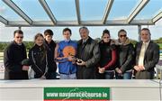 9 October 2013; William Flood, Chairman of Navan Racecourse, presents Joseph O'Brien with a bottle of champagne, after he broke Mick Kinane's record of 115 winners in an Irish Flat season, alongside his family, from left to right, father and trainer Aiden O'Brien, sister Ana, brother Donnacha, sister Sarah, mother Anne-Marie and Darren Lawlor, General Manager of Navan Racecourse. Navan Racecourse, Navan, Co. Meath. Picture credit: Matt Browne / SPORTSFILE