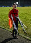 6 April 2025; Twelve year old Caoilin O'Reilly, from Abbeylara, in Longford, helps to collect flags after the Leinster GAA Football Senior Championship round one match between Longford and Wicklow at Glennon Brothers Pearse Park in Longford. Photo by Ray McManus/Sportsfile