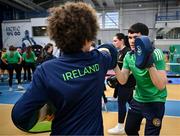 10 April 2025; Olympic athletes Kellie Harrington and Philip Doyle, along with Paralympian Orla Comerford, who are all Dare to Believe ambassadors, attended the Dare to Believe booth at PE Expo 2025, sponsored by Allianz, at the Sport Ireland National Indoor Arena in Dublin. Pictured at the Dare to Believe PE Expo 2025 is Jack Frehill hitting pads held by boxer Adam Hession. Photo by David Fitzgerald/Sportsfile