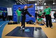 10 April 2025; Olympic athletes Kellie Harrington and Philip Doyle, along with Paralympian Orla Comerford, who are all Dare to Believe ambassadors, attended the Dare to Believe booth at PE Expo 2025, sponsored by Allianz, at the Sport Ireland National Indoor Arena in Dublin. Pictured at the Dare to Believe PE Expo 2025 is Isabelle Hogan and breakdancer Leon Dwyer. Photo by David Fitzgerald/Sportsfile