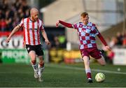 11 April 2025; Shane Farrell of Drogheda United in action against Liam Boyce of Derry City during the SSE Airtricity Men's Premier Division match between Derry City and Drogheda United at The Ryan McBride Brandywell Stadium in Derry. Photo by Stephen McCarthy/Sportsfile