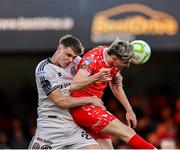 11 April 2025; Sean Boyd of Shelbourne in action against Leigh Kavanagh of Bohemians during the SSE Airtricity Men's Premier Division match between Shelbourne and Bohemians at Tolka Park in Dublin. Photo by Thomas Flinkow/Sportsfile