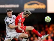 11 April 2025; Sean Boyd of Shelbourne in action against Leigh Kavanagh of Bohemians during the SSE Airtricity Men's Premier Division match between Shelbourne and Bohemians at Tolka Park in Dublin. Photo by Thomas Flinkow/Sportsfile