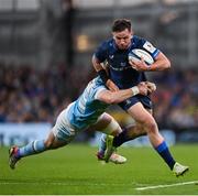 11 April 2025; Hugo Keenan of Leinster is tackled by Kyle Steyn of Glasgow Warriors during the Investec Champions Cup quarter-final match between Leinster and Glasgow Warriors at the Aviva Stadium in Dublin. Photo by Ramsey Cardy/Sportsfile