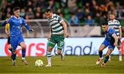 11 April 2025; Graham Burke of Shamrock Rovers in action against Waterford players Ben McCormack, left, and Darragh Leahy of Waterford during the SSE Airtricity Men's Premier Division match between Shamrock Rovers and Waterford at Tallaght Stadium in Dublin. Photo by Piaras Ó Mídheach/Sportsfile