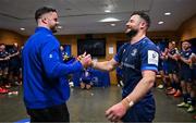 11 April 2025; Robbie Henshaw of Leinster is presented with his 50th European cap by team-mate James Ryan after the Investec Champions Cup quarter-final match between Leinster and Glasgow Warriors at the Aviva Stadium in Dublin. Photo by Brendan Moran/Sportsfile