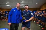 11 April 2025; Robbie Henshaw of Leinster is presented with his 50th European cap by team-mate James Ryan after the Investec Champions Cup quarter-final match between Leinster and Glasgow Warriors at the Aviva Stadium in Dublin. Photo by Brendan Moran/Sportsfile