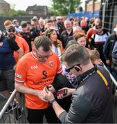 12 April 2025; Armagh supporter Oliver McGirr from Armagh City has his ticket scanned prior to entering before the Ulster GAA Football Senior Championship quarter-final match between Antrim and Armagh at Corrigan Park in Belfast. Photo by David Fitzgerald/Sportsfile