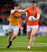 12 April 2025; Tiernan Kelly of Armagh in action against Eunan Walsh of Antrim during the Ulster GAA Football Senior Championship quarter-final match between Antrim and Armagh at Corrigan Park in Belfast. Photo by David Fitzgerald/Sportsfile
