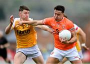 12 April 2025; Stefan Campbell of Armagh in action against Eunan Walsh of Antrim during the Ulster GAA Football Senior Championship quarter-final match between Antrim and Armagh at Corrigan Park in Belfast. Photo by David Fitzgerald/Sportsfile