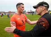 12 April 2025; Connaire Mackin of Armagh with manager Kieran McGeeney after the Ulster GAA Football Senior Championship quarter-final match between Antrim and Armagh at Corrigan Park in Belfast. Photo by David Fitzgerald/Sportsfile