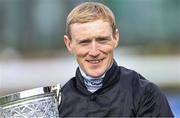12 April 2025; Jockey Billy Lee celebrates with the trophy after winning the Lodge Park Stud Irish EBF Park Express Stakes on One Look at The Curragh Racecourse in Kildare. Photo by Thomas Doolin/Sportsfile