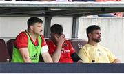12 April 2025; Munster players, from left, Fineen Wycherley, Peter O'Mahony and Diarmuid Barron react on the bench during the Investec Champions Cup quarter-final match between Bordeaux Begles and Munster at Stade Chaban-Delmas in Bordeaux, France. Photo by Brendan Moran/Sportsfile