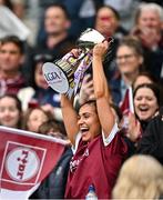 12 April 2025; Kate Geraghty of Galway lifts the trophy following the 2025 Lidl Ladies National Football League Division 2 Final between Cork and Galway at Croke Park, Dublin.  during the Lidl Ladies National Football League Division 2 final match between Cork and Galway at Croke Park in Dublin. Photo by Sam Barnes/Sportsfile