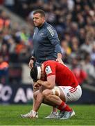12 April 2025; Tom Ahern of Munster is consoled by Munster provincial talent coach Seán Cronin after the Investec Champions Cup quarter-final match between Bordeaux Begles and Munster at Stade Chaban-Delmas in Bordeaux, France. Photo by Brendan Moran/Sportsfile