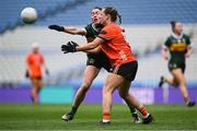 12 April 2025; Aoife McCoy of Armagh makes a pass despite the efforts of Eilis Lynch of Kerry during the Lidl Ladies National Football League Division 1 final match between Armagh and Kerry at Croke Park in Dublin. Photo by Shauna Clinton/Sportsfile