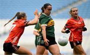 12 April 2025; Danielle O'Leary of Kerry scores a point despite the efforts of Grace Ferguson of Armagh during the Lidl Ladies National Football League Division 1 final match between Armagh and Kerry at Croke Park in Dublin. Photo by Shauna Clinton/Sportsfile