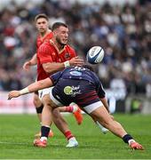 12 April 2025; Alex Nankivell of Munster is tackled by Connor Sa of Bordeaux Begles during the Investec Champions Cup quarter-final match between Bordeaux Begles and Munster at Stade Chaban-Delmas in Bordeaux, France. Photo by Brendan Moran/Sportsfile