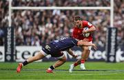 12 April 2025; Alex Nankivell of Munster is tackled by Connor Sa of Bordeaux Begles during the Investec Champions Cup quarter-final match between Bordeaux Begles and Munster at Stade Chaban-Delmas in Bordeaux, France. Photo by Brendan Moran/Sportsfile