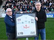12 April 2025; Kildare GAA Chairman Mick Mullen, left, makes a presentation of behalf of Kildare GAA to the family of the late Mick O'Dwyer and accepted by his son and former Kildare footballer Karl O'Dwyer before the Leinster GAA Football Senior Championship quarter-final match between Kildare and Westmeath at Cedral St Conleth's Park in Newbridge, KiIdare. Photo by Piaras Ó Mídheach/Sportsfile