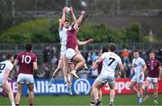 12 April 2025; Kevin Feely of Kildare in action against Fionn O'Hara of Westmeath, front, during the Leinster GAA Football Senior Championship quarter-final match between Kildare and Westmeath at Cedral St Conleth's Park in Newbridge, KiIdare. Photo by Piaras Ó Mídheach/Sportsfile