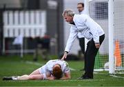 12 April 2025; Umpire Eugene Gough, father of referee David Gough, checks on the injured Harry O'Neill of Kildare during the Leinster GAA Football Senior Championship quarter-final match between Kildare and Westmeath at Cedral St Conleth's Park in Newbridge, KiIdare. Photo by Piaras Ó Mídheach/Sportsfile