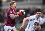 12 April 2025; Luke Loughlin of Westmeath in action against Mark Dempsey of Kildare during the Leinster GAA Football Senior Championship quarter-final match between Kildare and Westmeath at Cedral St Conleth's Park in Newbridge, KiIdare. Photo by Piaras Ó Mídheach/Sportsfile