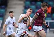 12 April 2025; Brian Byrne of Kildare wins possession ahead of Luke Loughlin of Westmeath during the Leinster GAA Football Senior Championship quarter-final match between Kildare and Westmeath at Cedral St Conleth's Park in Newbridge, Kildare. Photo by Piaras Ó Mídheach/Sportsfile