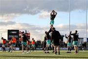 12 April 2025; Connacht players warm up before the EPCR Challenge Cup quarter-final match between Connacht and Racing 92 at Dexcom Stadium in Galway. Photo by Thomas Flinkow/Sportsfile