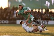 12 April 2025; Josh Murphy of Connacht is tackled by Nolann le Garrec of Racing 92 during the EPCR Challenge Cup quarter-final match between Connacht and Racing 92 at Dexcom Stadium in Galway. Photo by Thomas Flinkow/Sportsfile
