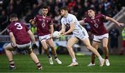 12 April 2025; Kevin Feely of Kildare in action against Westmeath players, from left, David Giles, Brían Cooney and Kevin O'Sullivan during the Leinster GAA Football Senior Championship quarter-final match between Kildare and Westmeath at Cedral St Conleth's Park in Newbridge, KiIdare. Photo by Piaras Ó Mídheach/Sportsfile