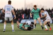 12 April 2025; Josh Ioane of Connacht is tackled by Vinaya Habosi of Racing 92 during the EPCR Challenge Cup quarter-final match between Connacht and Racing 92 at Dexcom Stadium in Galway. Photo by Thomas Flinkow/Sportsfile