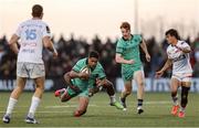 12 April 2025; Josh Ioane of Connacht is tackled by Vinaya Habosi of Racing 92 during the EPCR Challenge Cup quarter-final match between Connacht and Racing 92 at Dexcom Stadium in Galway. Photo by Thomas Flinkow/Sportsfile