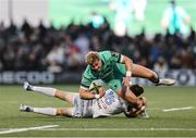 12 April 2025; Hugh Gavin of Connacht is tackled by Sam James of Racing 92 during the EPCR Challenge Cup quarter-final match between Connacht and Racing 92 at Dexcom Stadium in Galway. Photo by Thomas Flinkow/Sportsfile
