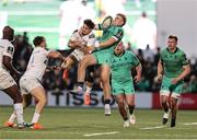 12 April 2025; Hugh Gavin of Connacht in action against Max Spring of Racing 92 during the EPCR Challenge Cup quarter-final match between Connacht and Racing 92 at Dexcom Stadium in Galway. Photo by Thomas Flinkow/Sportsfile
