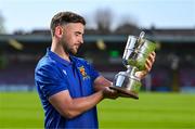 15 April 2025; College Corinthians FC captain Craig Donnellan poses for a portrait with the Pat O'Brien FAI Intermediate Challenge Cup during the FAI Intermediate Cup Final media day at Turners Cross Stadium in Cork ahead of the 2025 FAI Intermediate Cup final match between Ringmahon Rangers FC and College Corinthians FC. Photo by Brendan Moran/Sportsfile