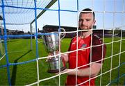 15 April 2025; Ringmahon Rangers FC captain Anthony McAlavey poses for a portrait with the Pat O'Brien FAI Intermediate Challenge Cup during the FAI Intermediate Cup Final media day at Turners Cross Stadium in Cork ahead of the 2025 FAI Intermediate Cup final match between Ringmahon Rangers FC and College Corinthians FC. Photo by Brendan Moran/Sportsfile