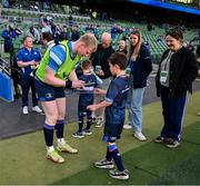 11 April 2025; Leinster mascot Paddy Donnelly with Leinster player Jamie Osborne before the Investec Champions Cup quarter-final match between Leinster and Glasgow Warriors at the Aviva Stadium in Dublin. Photo by Brendan Moran/Sportsfile