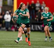 12 April 2025; Eve Higgins of Ireland in action against England during the Women's Six Nations Rugby Championship match between Ireland and England at Virgin Media Park in Cork. Photo by Matt Browne/Sportsfile