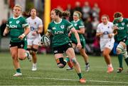 12 April 2025; Eve Higgins of Ireland in action against England during the Women's Six Nations Rugby Championship match between Ireland and England at Virgin Media Park in Cork. Photo by Matt Browne/Sportsfile