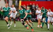 12 April 2025; Eve Higgins of Ireland in action against England during the Women's Six Nations Rugby Championship match between Ireland and England at Virgin Media Park in Cork. Photo by Matt Browne/Sportsfile
