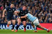 11 April 2025; Tadhg Furlong of Leinster is tackled by Matt Fagerson of Glasgow Warriors during the Investec Champions Cup quarter-final match between Leinster and Glasgow Warriors at the Aviva Stadium in Dublin. Photo by Brendan Moran/Sportsfile